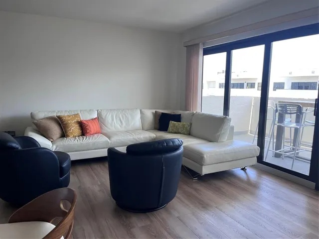 a view of a kitchen from the hallway