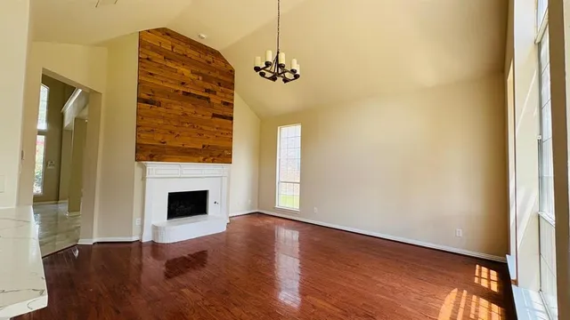 a kitchen with stainless steel appliances granite countertop a stove and a refrigerator