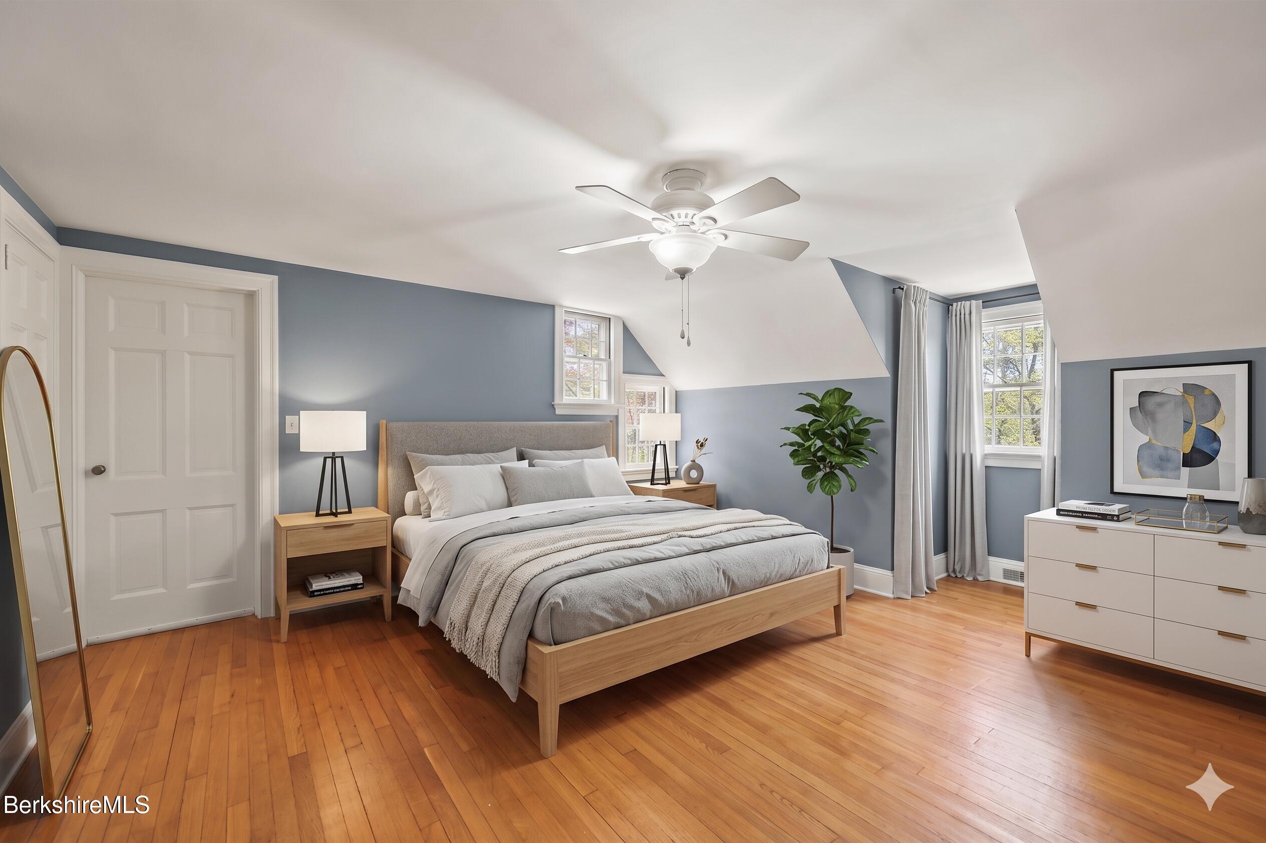 100 South Prospect Street Lee, MA 01238 - Photo 27 of 46 a bedroom with a bed chandelier and a window