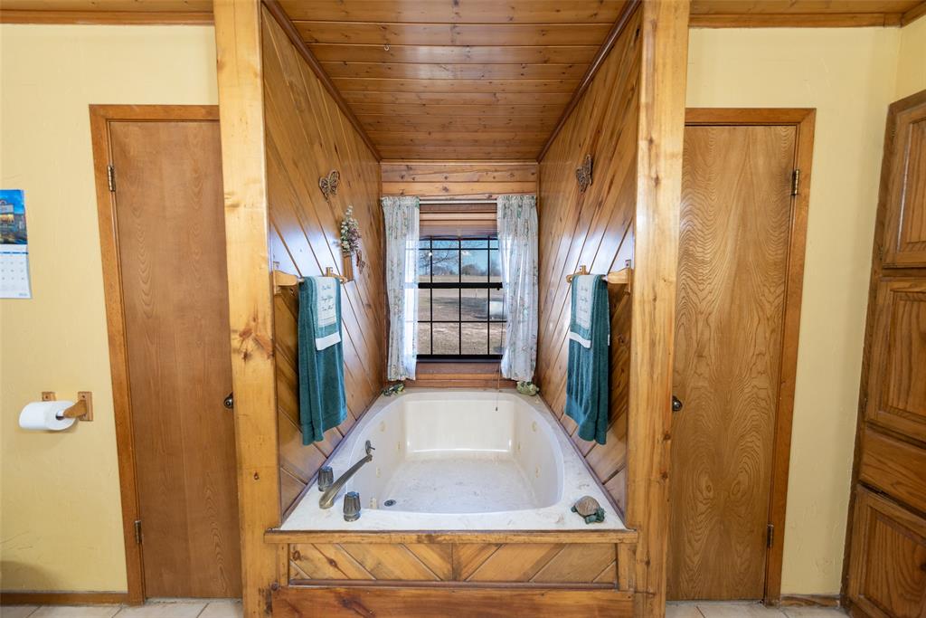 419 County Road Southeast Scroggins, TX 75480 - Photo 18 of 30 a view of entry way with wooden door