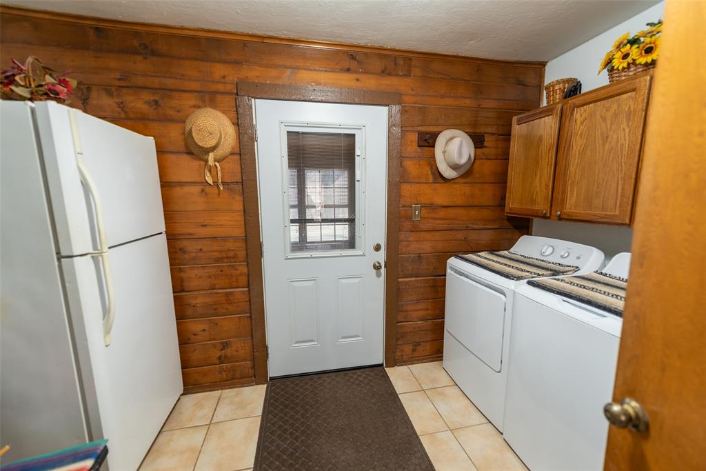 419 County Road Southeast Scroggins, TX 75480 - Photo 20 of 30 a kitchen with a refrigerator and a stove