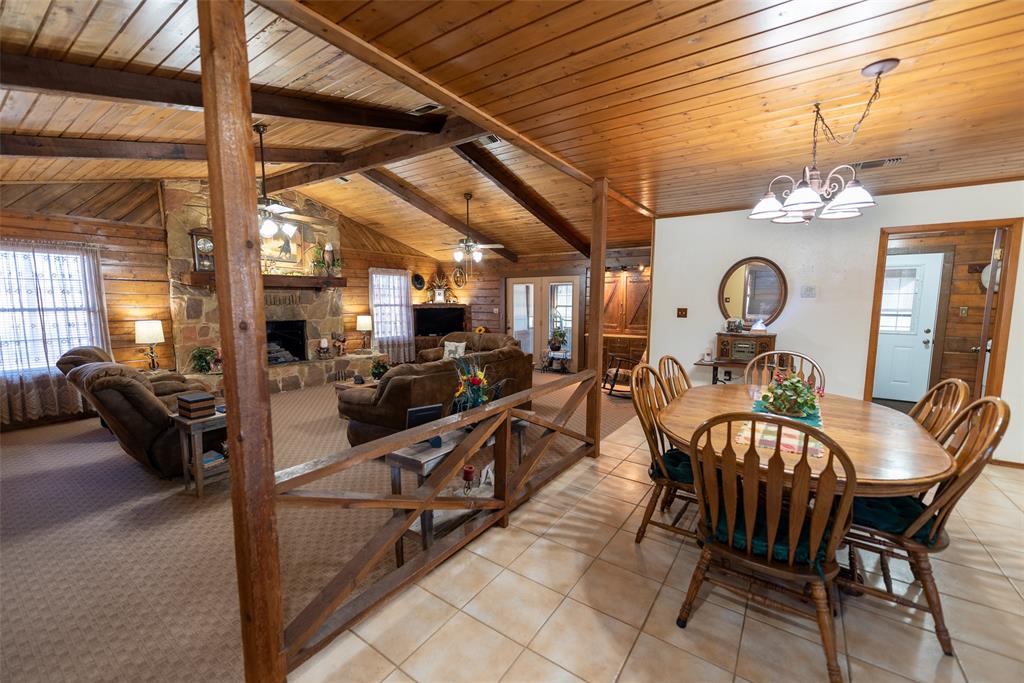 419 County Road Southeast Scroggins, TX 75480 - Photo 9 of 30 a view of a dining room with furniture