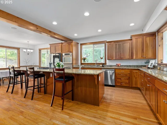 a kitchen with lots of counter top space and appliances