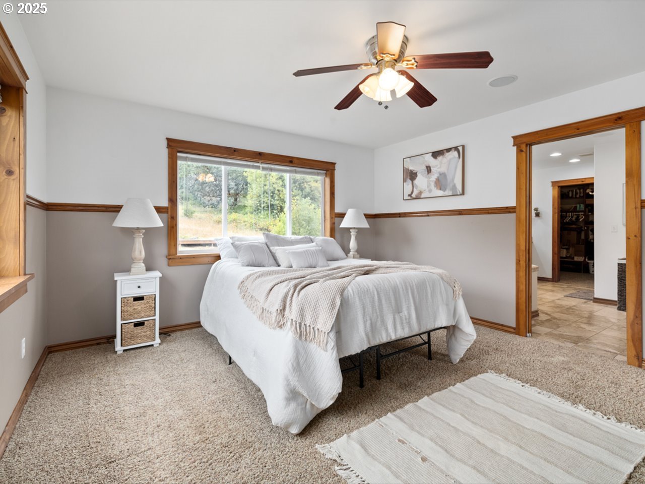 33678 Marys River Estates Road Philomath, OR 97370 - Photo 36 of 48 a bed room with a bed and a chandelier