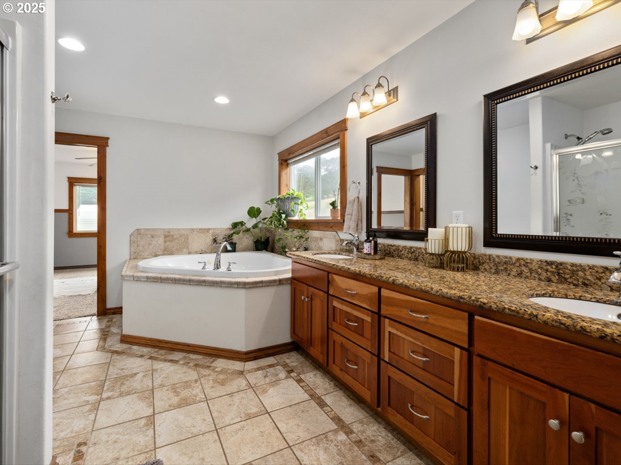 33678 Marys River Estates Road Philomath, OR 97370 - Photo 38 of 48 a bathroom with a granite countertop sink and a large mirror