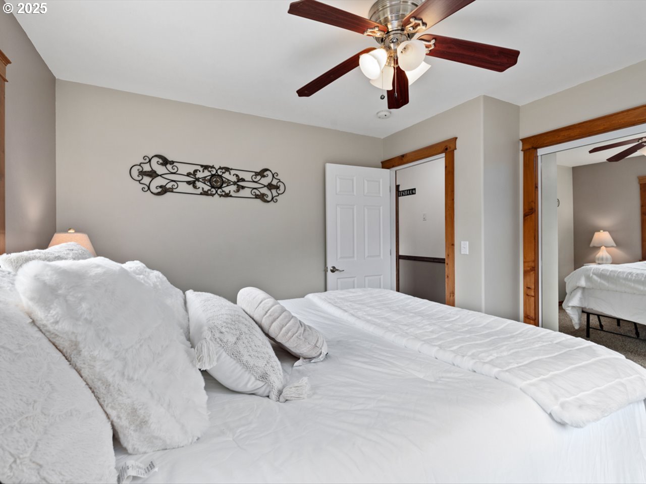 33678 Marys River Estates Road Philomath, OR 97370 - Photo 42 of 48 a bedroom with a bed and a chandelier