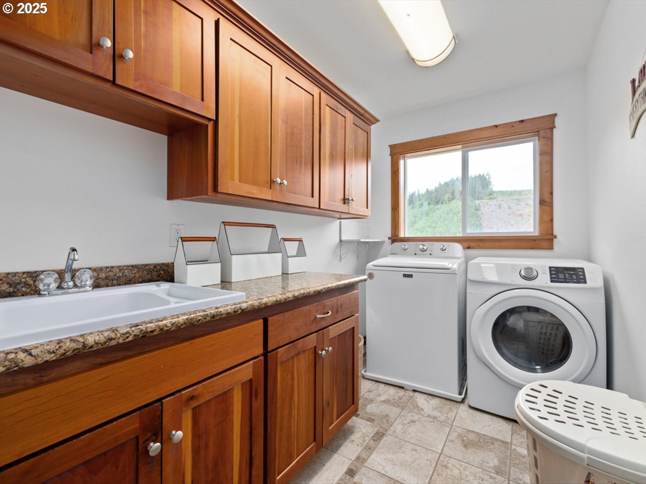 33678 Marys River Estates Road Philomath, OR 97370 - Photo 45 of 48 a kitchen with a sink a stove top oven and cabinets