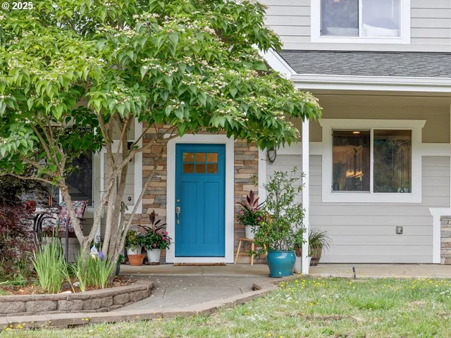 front view of a house with a yard