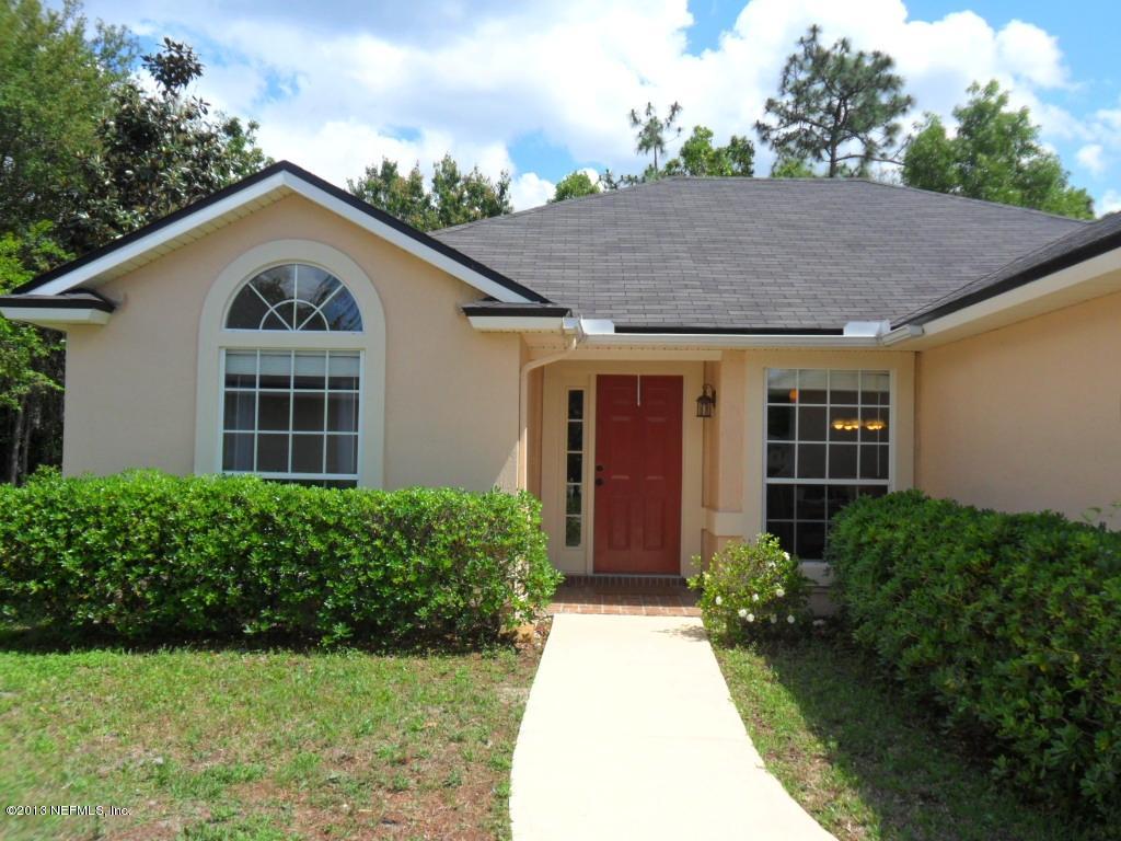 716 South Lilac Loop St. Johns, FL 32259 - Photo 1 of 22 a view of a house with garden and yard