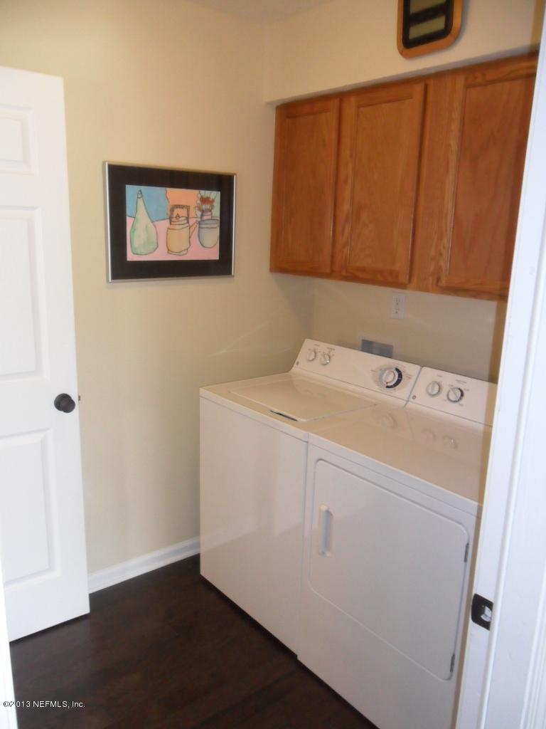 716 South Lilac Loop St. Johns, FL 32259 - Photo 10 of 22 a utility room with dryer and washer