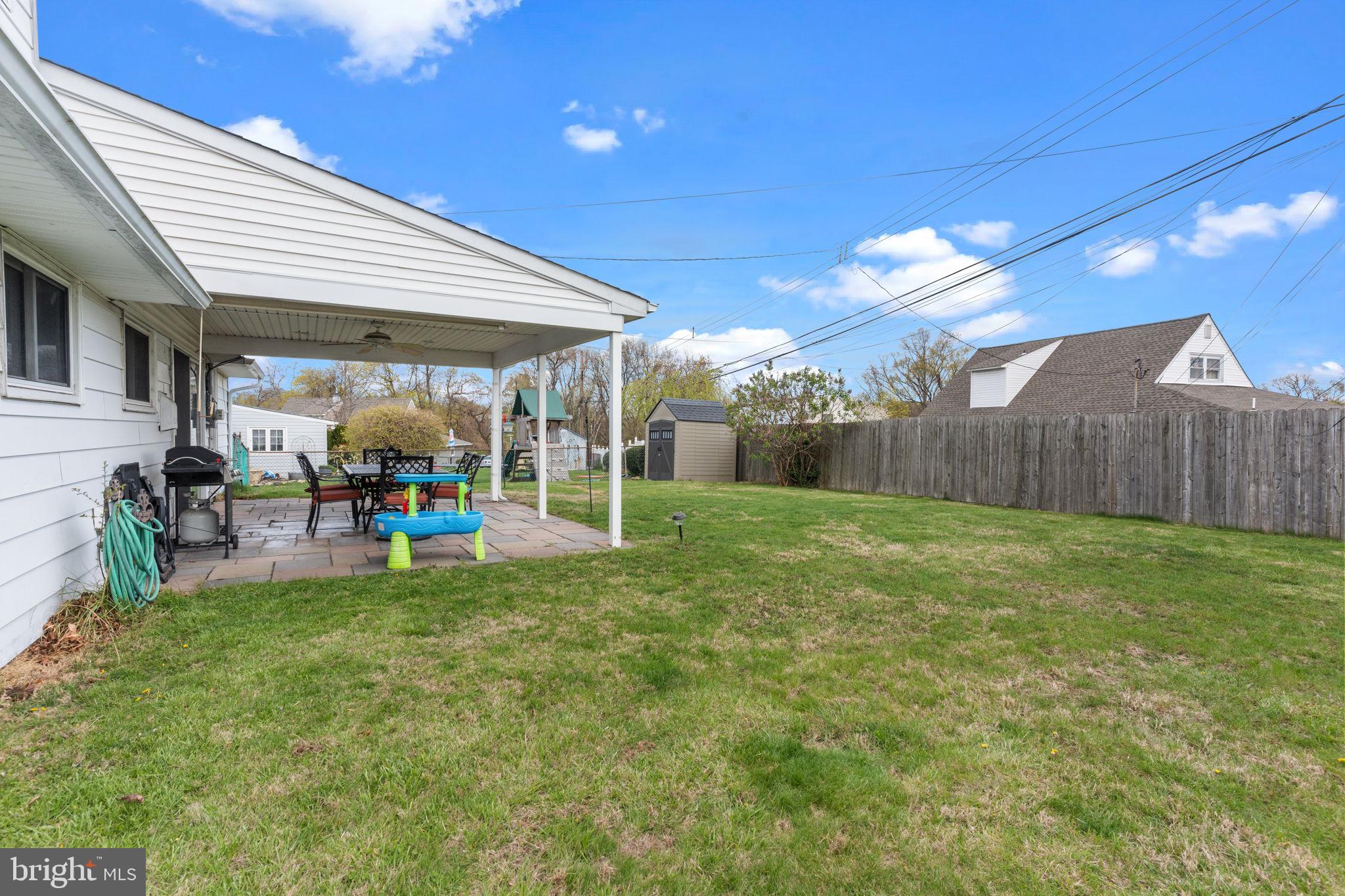 58 Tinder Road Levittown, PA 19056 - Photo 20 of 20 a view of a house with backyard porch and sitting area