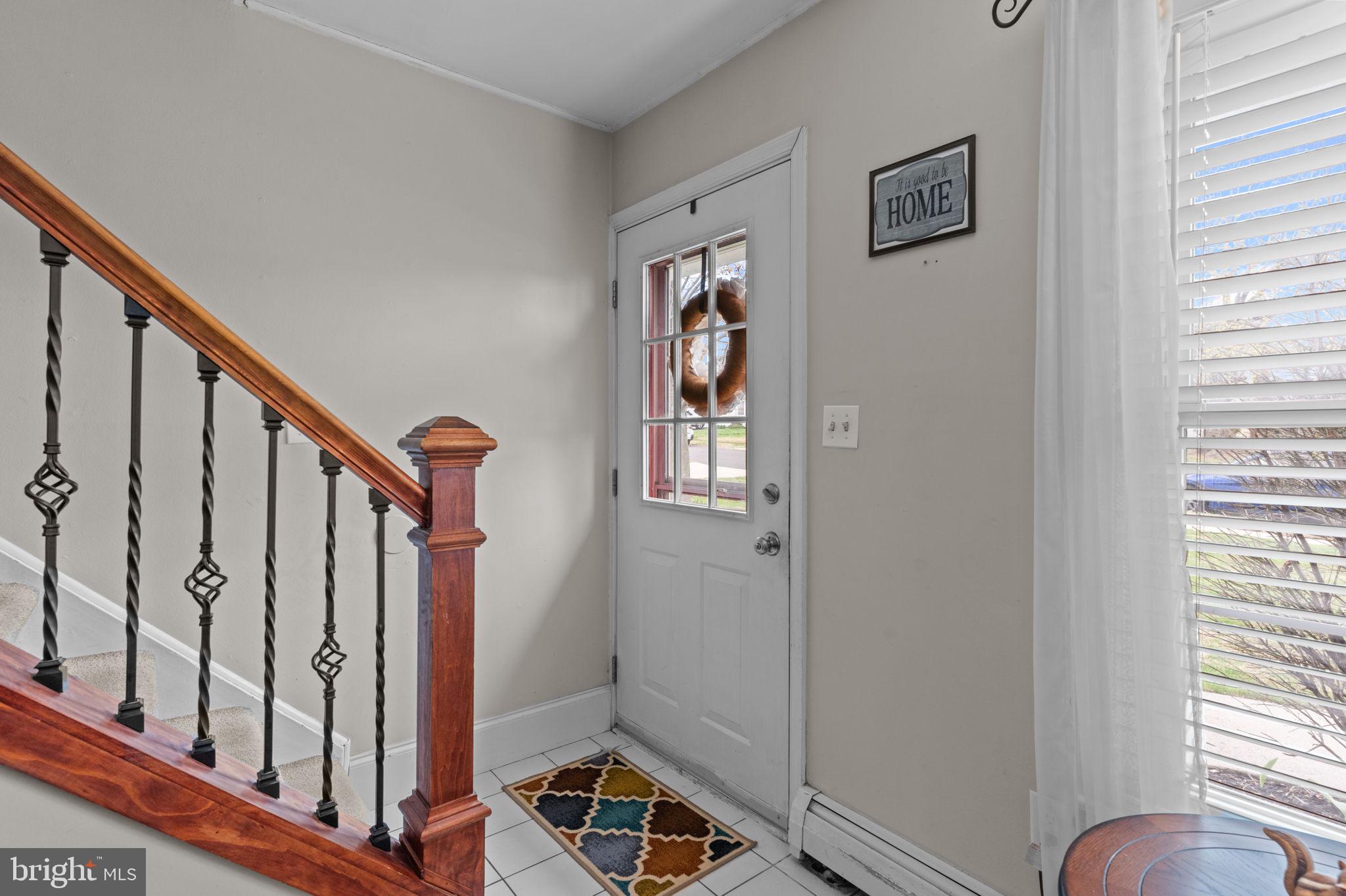 58 Tinder Road Levittown, PA 19056 - Photo 4 of 20 a view of an entryway with wooden floor