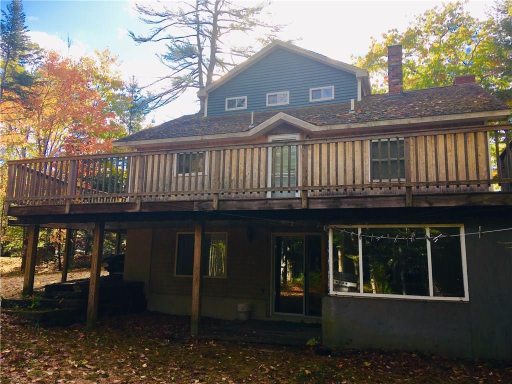 317 Georges Pond Road Franklin, ME 04634 - Photo 3 of 30 Backside of the house, featuring a...
