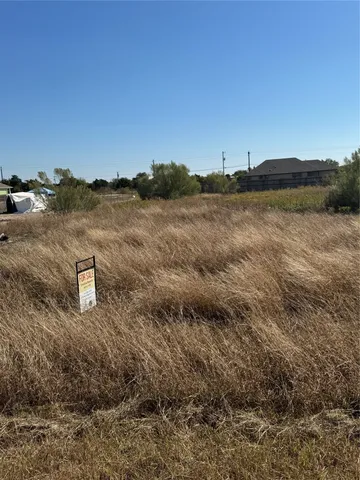 a view of a lake with mountains in the background