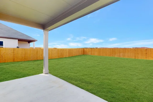 a view of an outdoor space and a yard