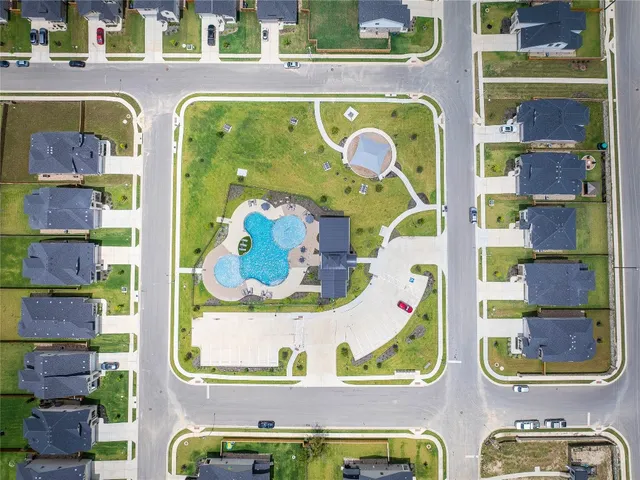 an aerial view of a swimming pool