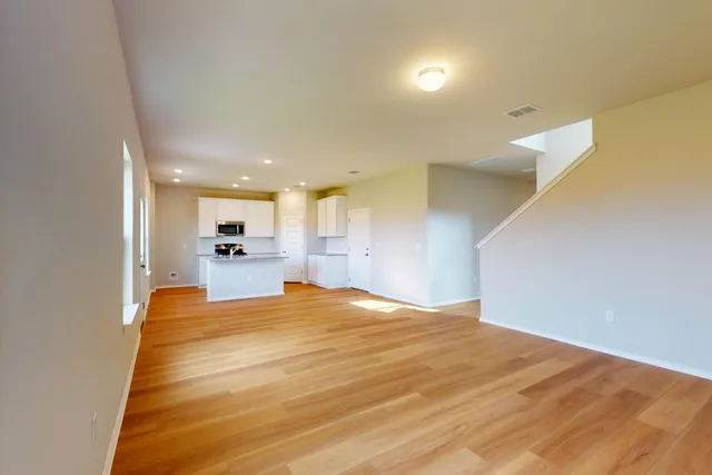 a view of kitchen and kitchen with furniture