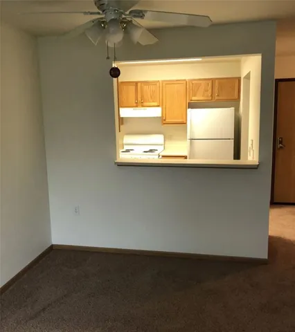a view of a room that has a window