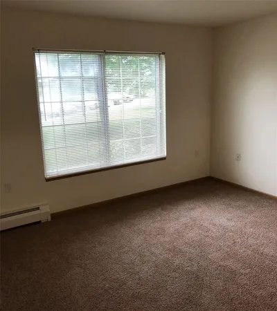 an empty room with a window