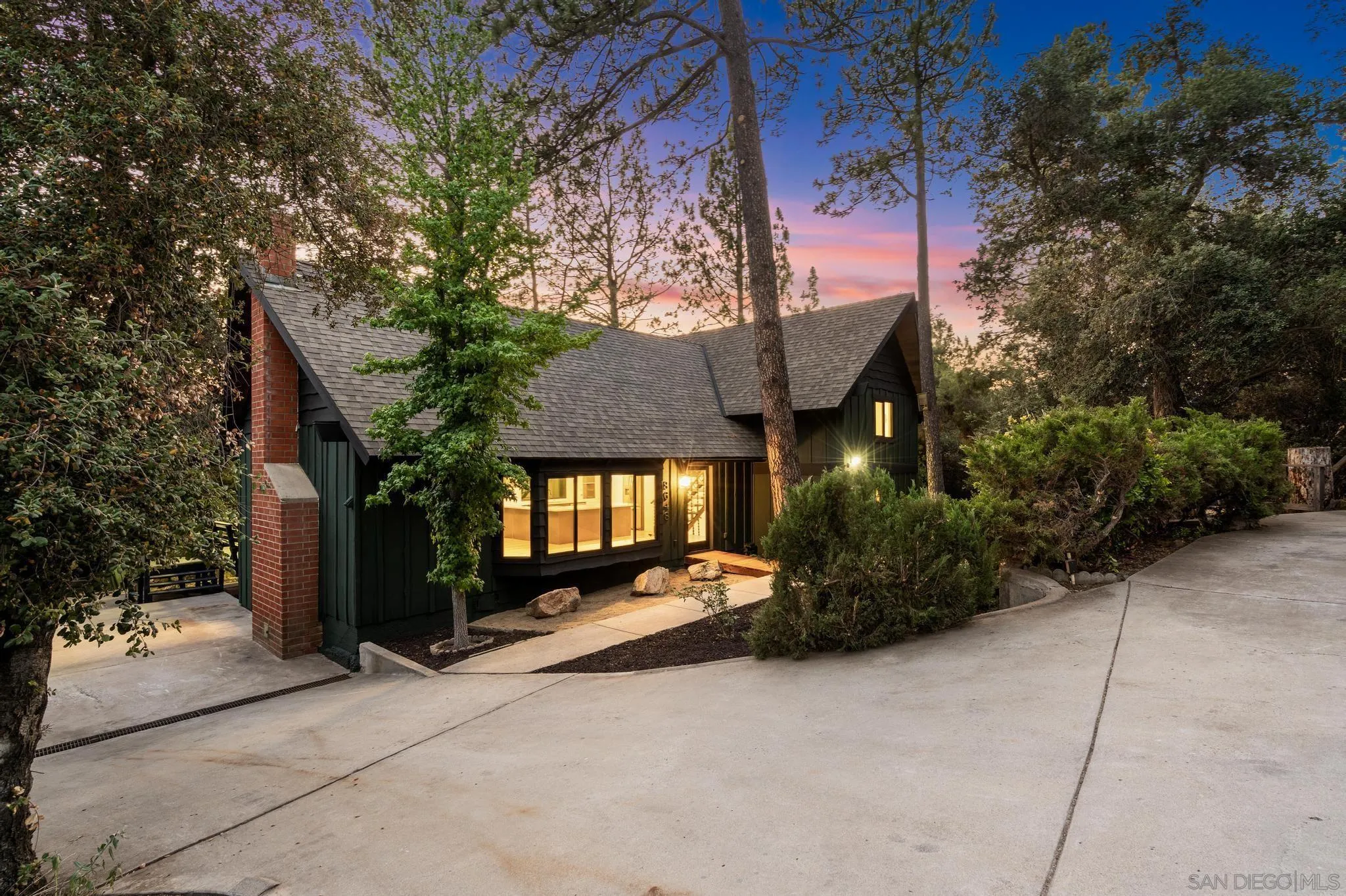8648 Valley View Trail Pine Valley, CA 91962 - Photo 2 of 50 a front view of a house with a yard and garage