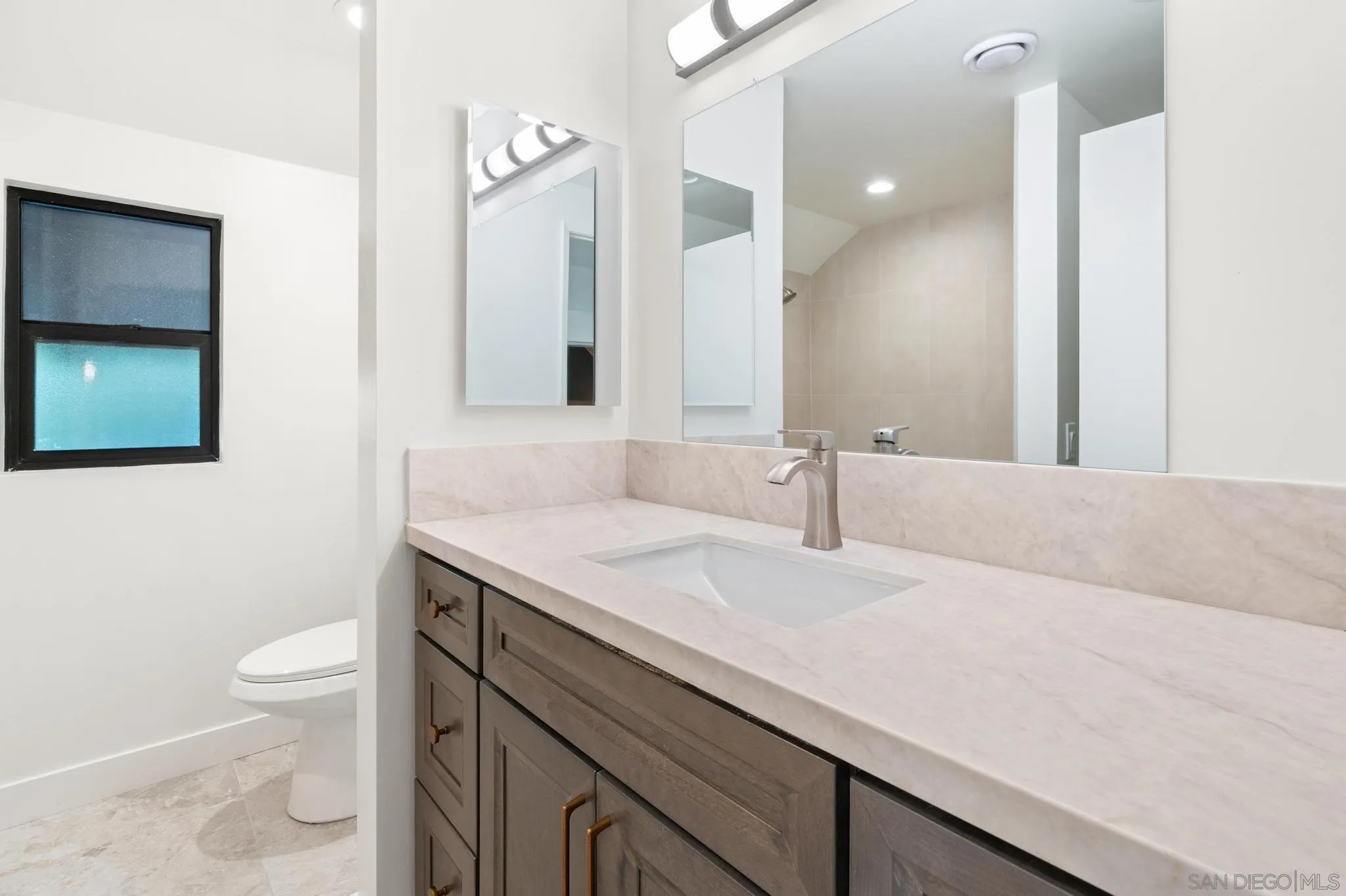 8648 Valley View Trail Pine Valley, CA 91962 - Photo 21 of 50 a bathroom with a sink a toilet and mirror