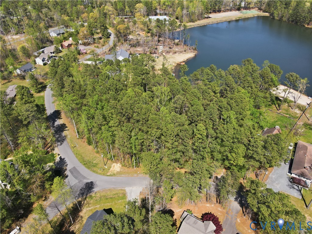 view of a lake with a building in the background