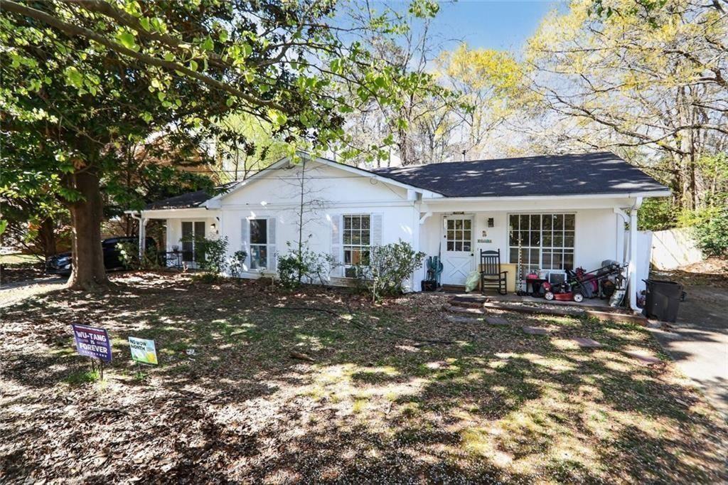 332 Lockwood Terrace Decatur, GA 30030 - Photo 1 of 22 a front view of a house with a yard