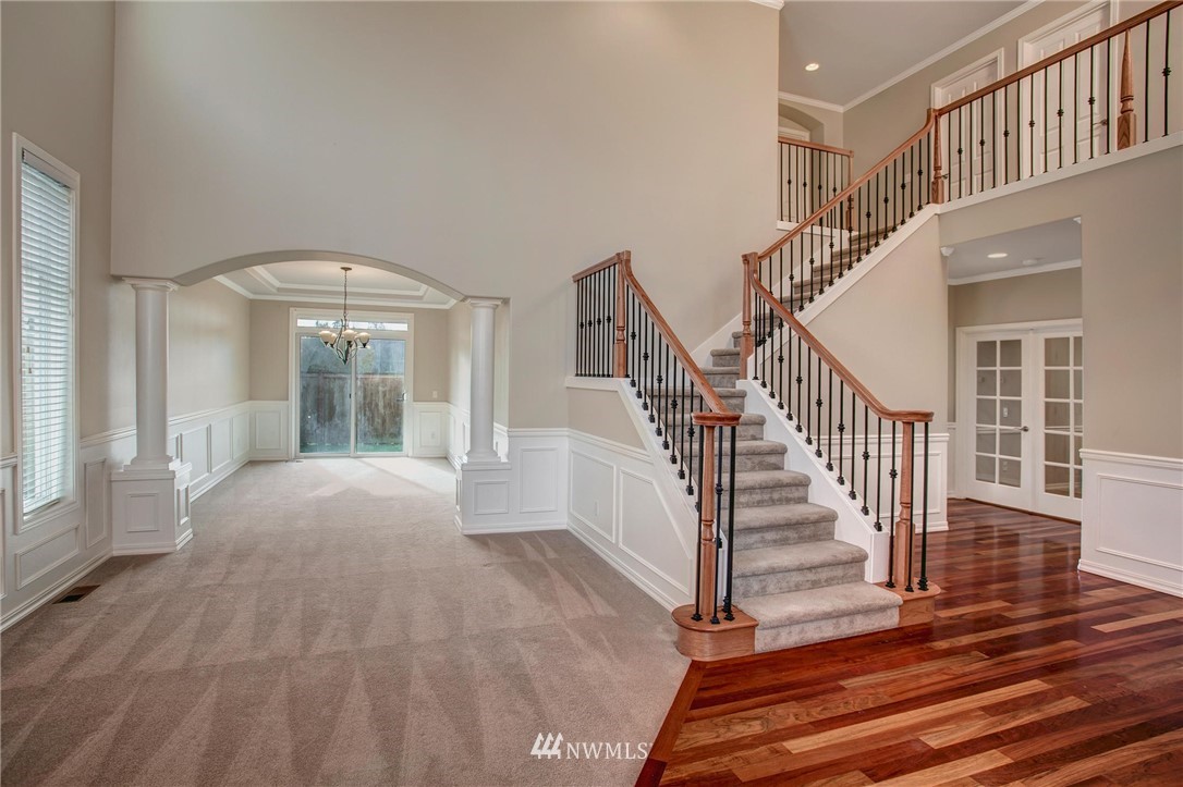 4014 215th Street Southeast Bothell, WA 98021 - Photo 2 of 25 a view of entryway and hall with wooden floor