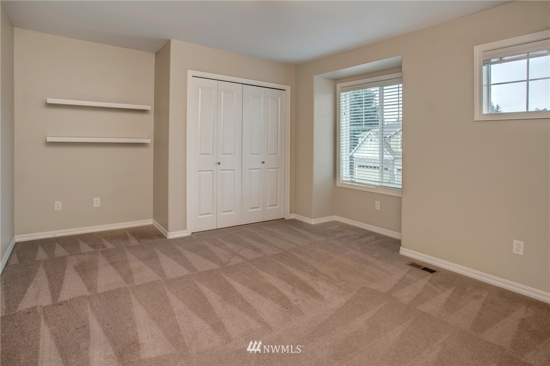 4014 215th Street Southeast Bothell, WA 98021 - Photo 20 of 25 a view of an empty room with a window