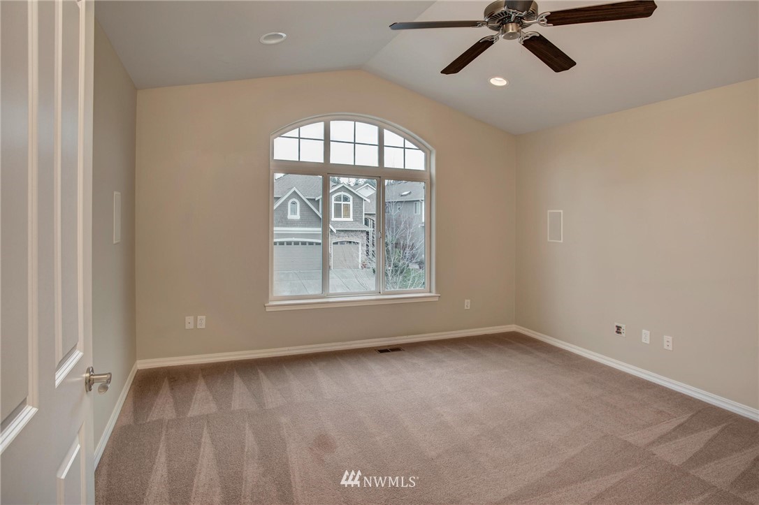 4014 215th Street Southeast Bothell, WA 98021 - Photo 23 of 25 an empty room with a window