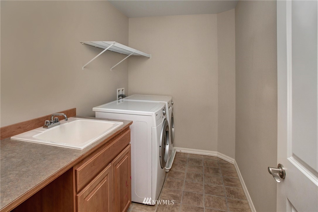 4014 215th Street Southeast Bothell, WA 98021 - Photo 24 of 25 a utility room with dryer and washer