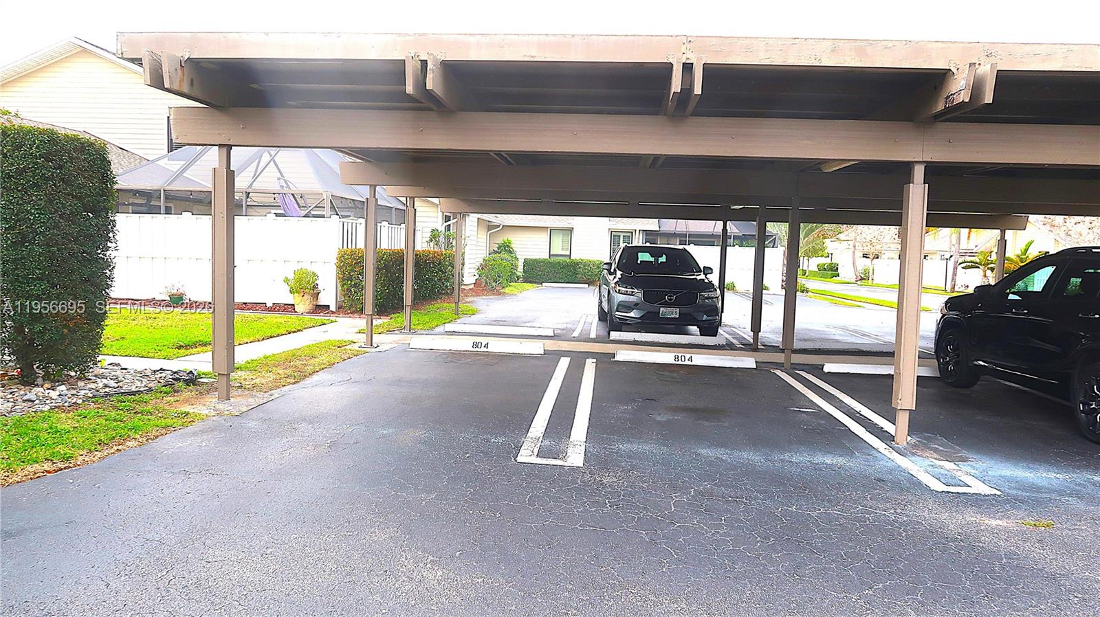 804 Summerwinds Lane Jupiter, FL 33458 - Photo 15 of 17 Covered Carport - 2 spaces