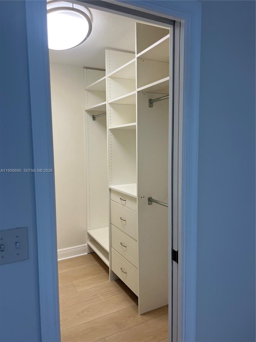 804 Summerwinds Lane Jupiter, FL 33458 - Photo 9 of 17 Walk-in closet - Primary Bedroom