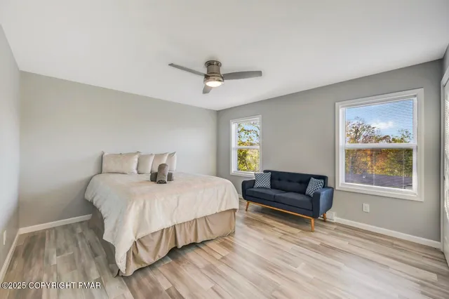 a view of livingroom with furniture and a window