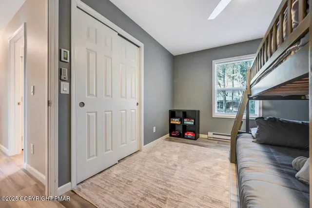 a view of a house with wooden deck and a backyard
