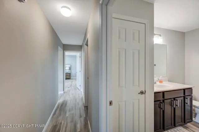 a view of a balcony with wooden floor