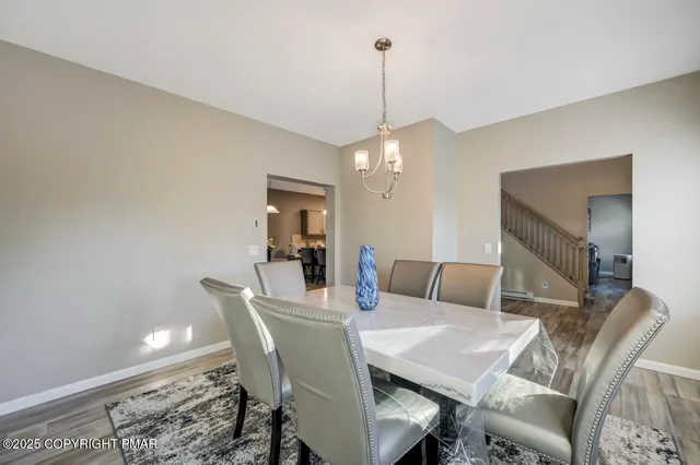 a view of a dining room with furniture