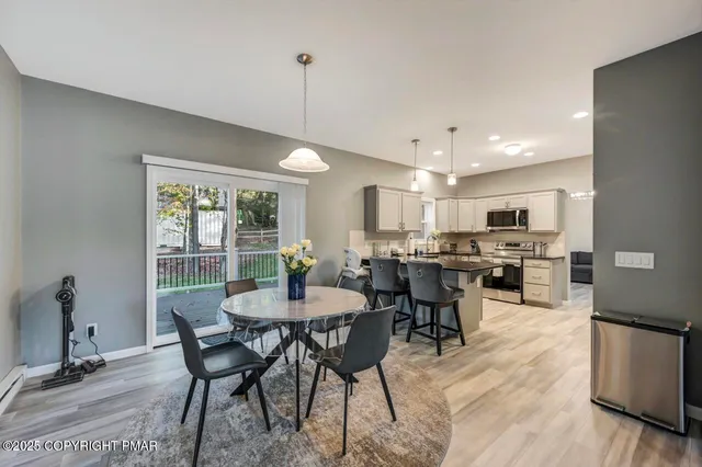 a view of a dining room with furniture
