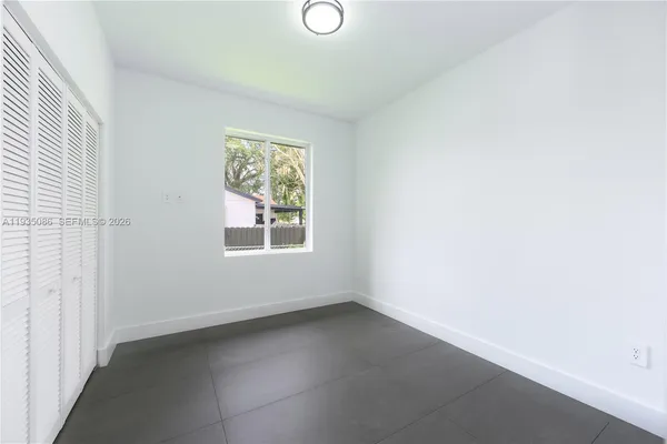 an empty room with a window