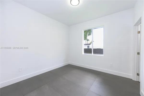 an empty room with a window