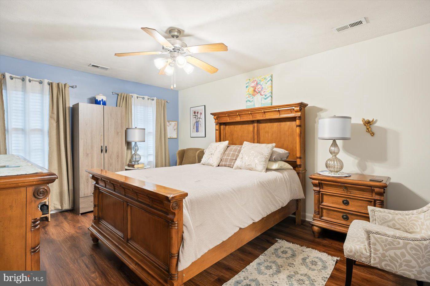 8472 Colfax Drive King George, VA 22485 - Photo 24 of 62 a bed room with a bed and a chandelier