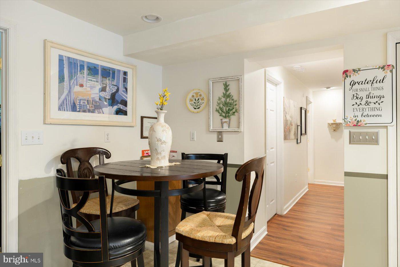 8472 Colfax Drive King George, VA 22485 - Photo 37 of 62 a view of a dining room with furniture and wooden floor