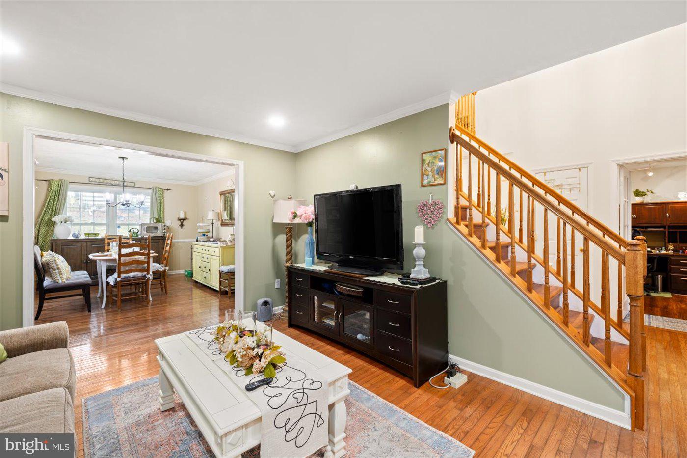 8472 Colfax Drive King George, VA 22485 - Photo 9 of 62 a living room with furniture and a flat screen tv