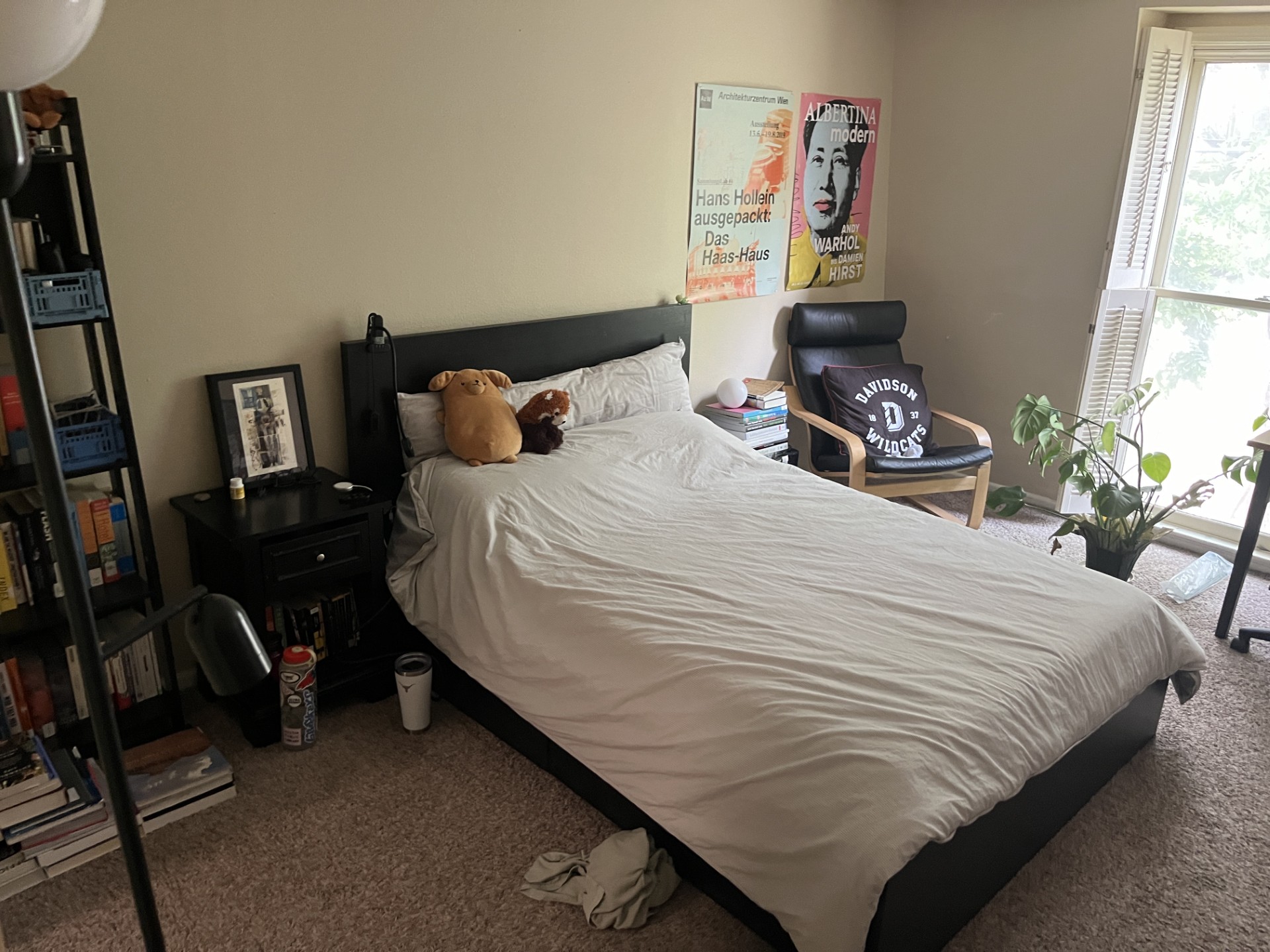 2704 San Pedro Street, Unit 2 Austin, TX 78705 - Photo 11 of 16 a bedroom with a bed and wooden floor