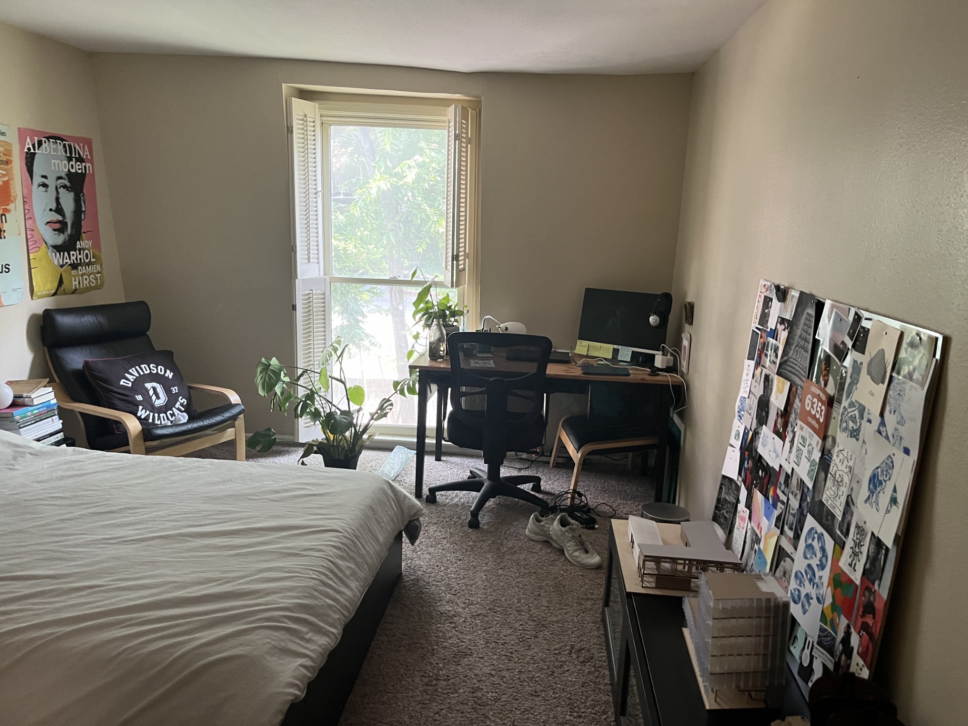 2704 San Pedro Street, Unit 2 Austin, TX 78705 - Photo 12 of 16 a bedroom with a bed and a window
