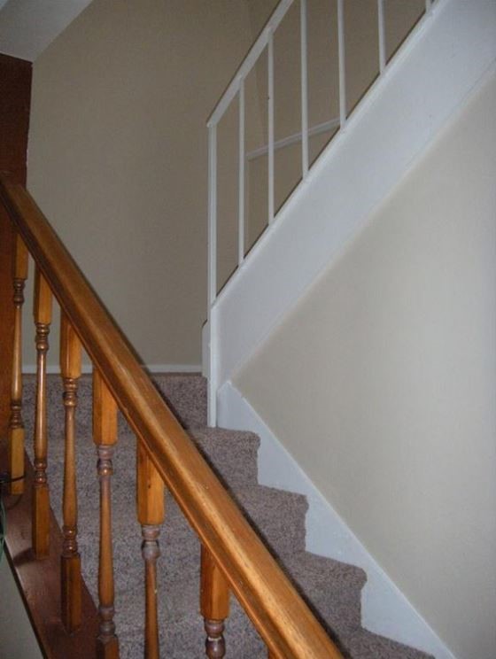2704 San Pedro Street, Unit 2 Austin, TX 78705 - Photo 13 of 23 a view of staircase with railing and white walls