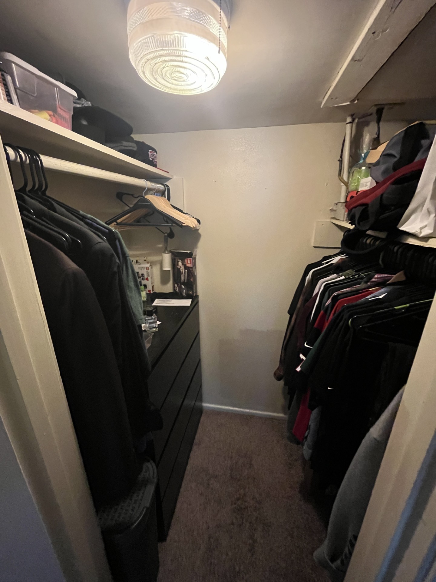 2704 San Pedro Street, Unit 2 Austin, TX 78705 - Photo 15 of 16 a view of walk in closet with clothes and shoes
