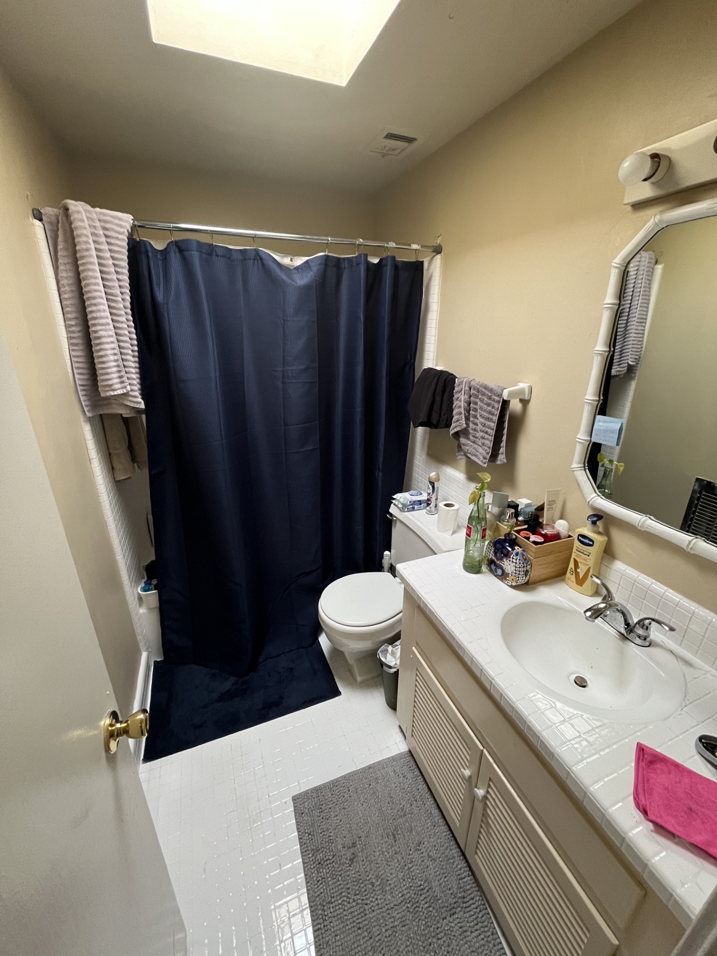 2704 San Pedro Street, Unit 2 Austin, TX 78705 - Photo 16 of 16 a bathroom with a sink toilet and shower