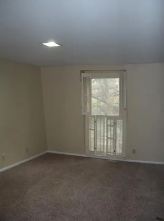 a view of hallway with shower