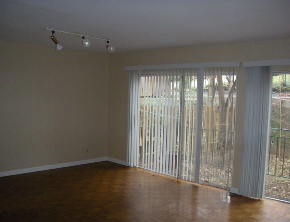 2704 San Pedro Street, Unit 2 Austin, TX 78705 - Photo 7 of 23 wooden floor in an empty room with a window